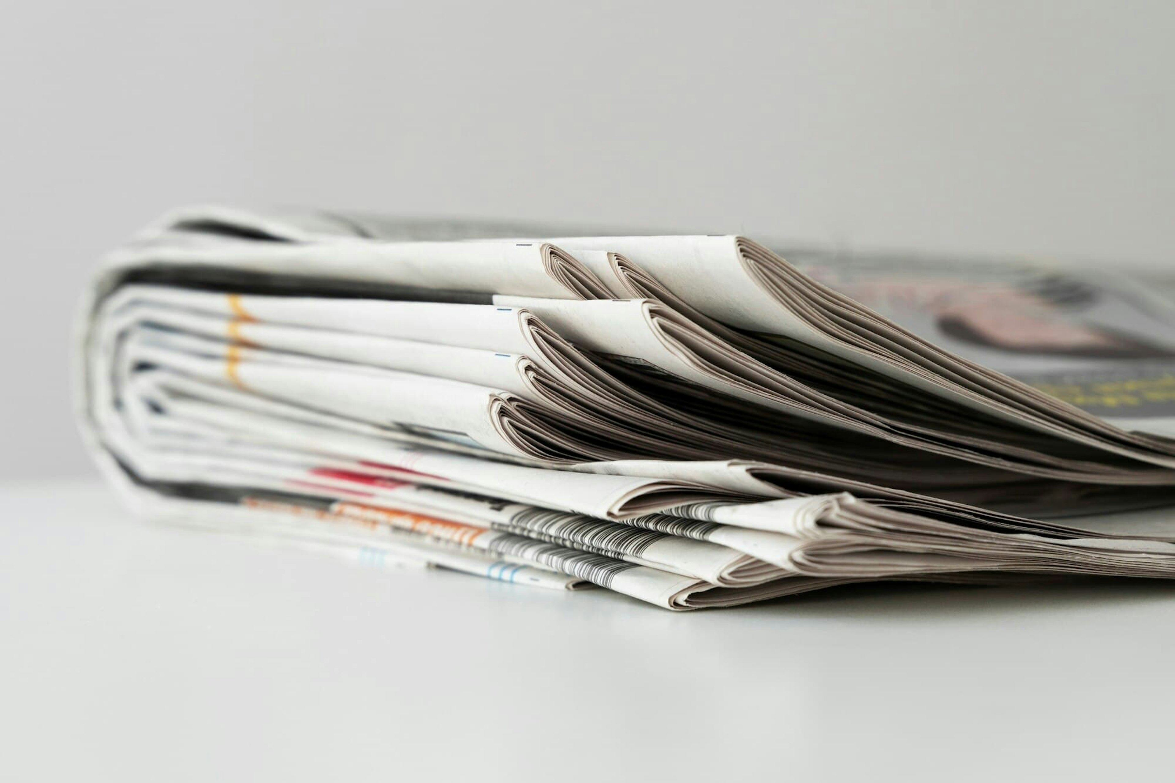 Newspapers on a table