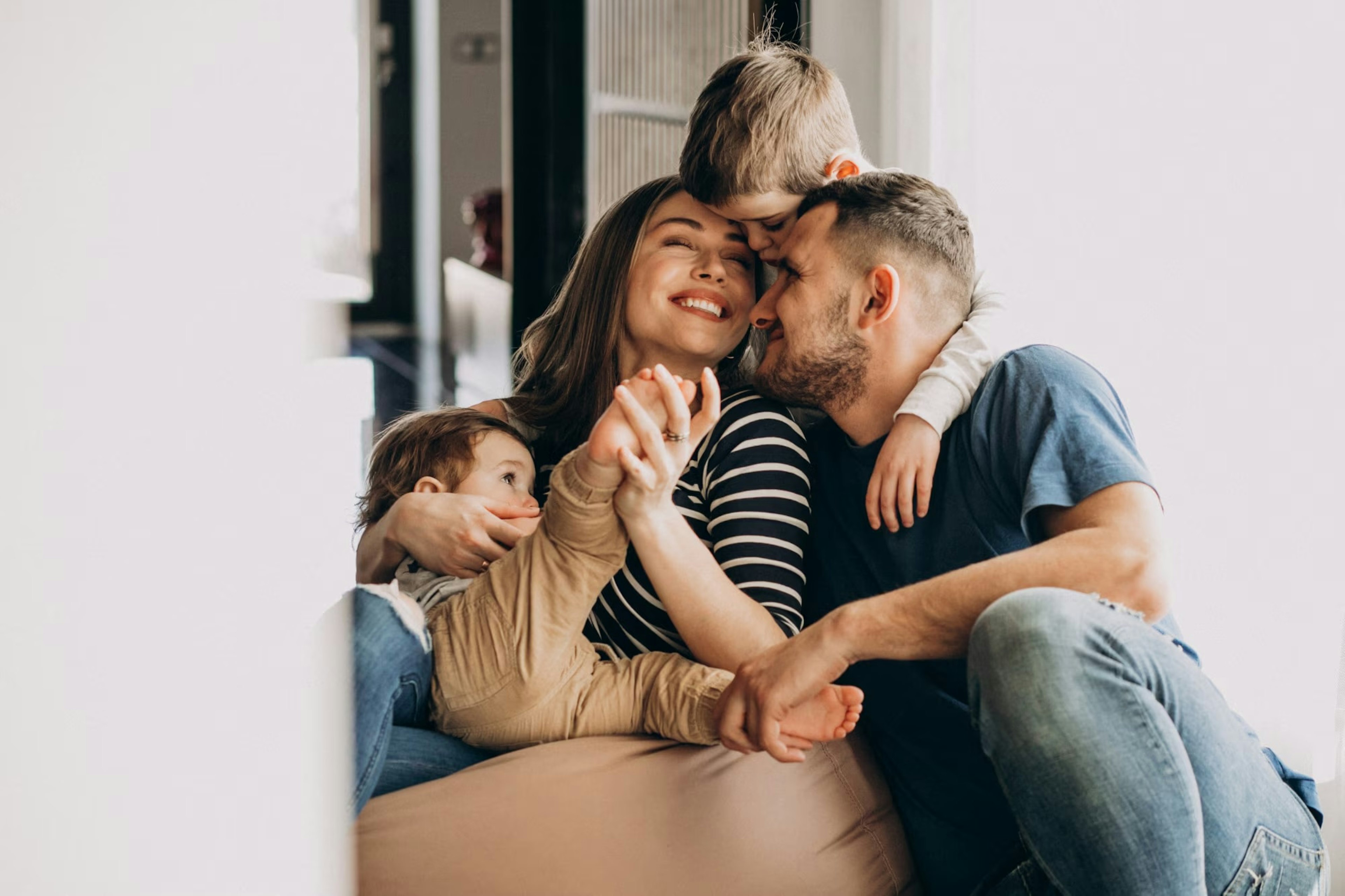 A couple is playing with their child